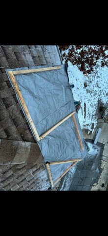 Storm Damage Emergency Service Tarp to keep the water out. — photo 3